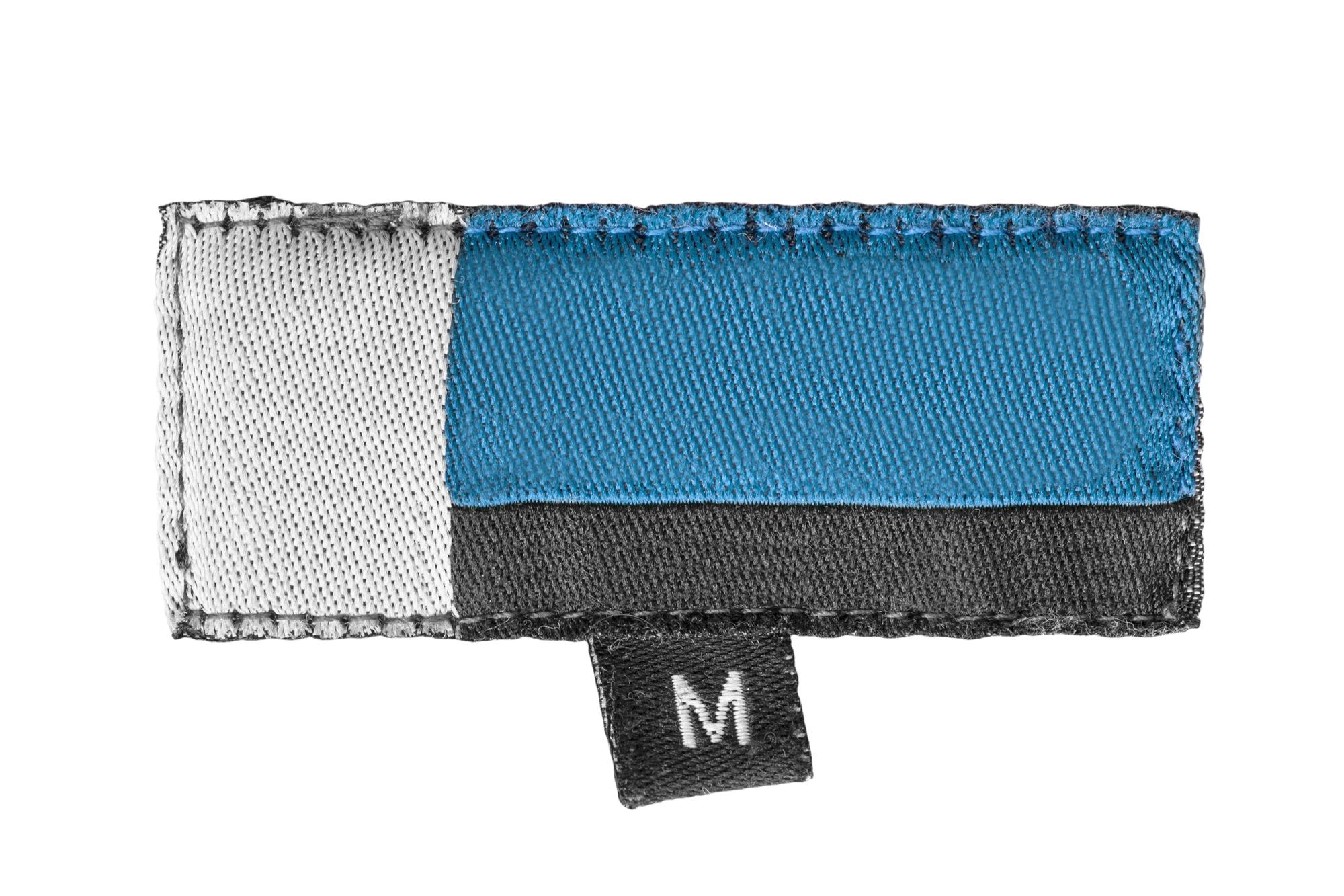 Finished embroidered patch attached to denim